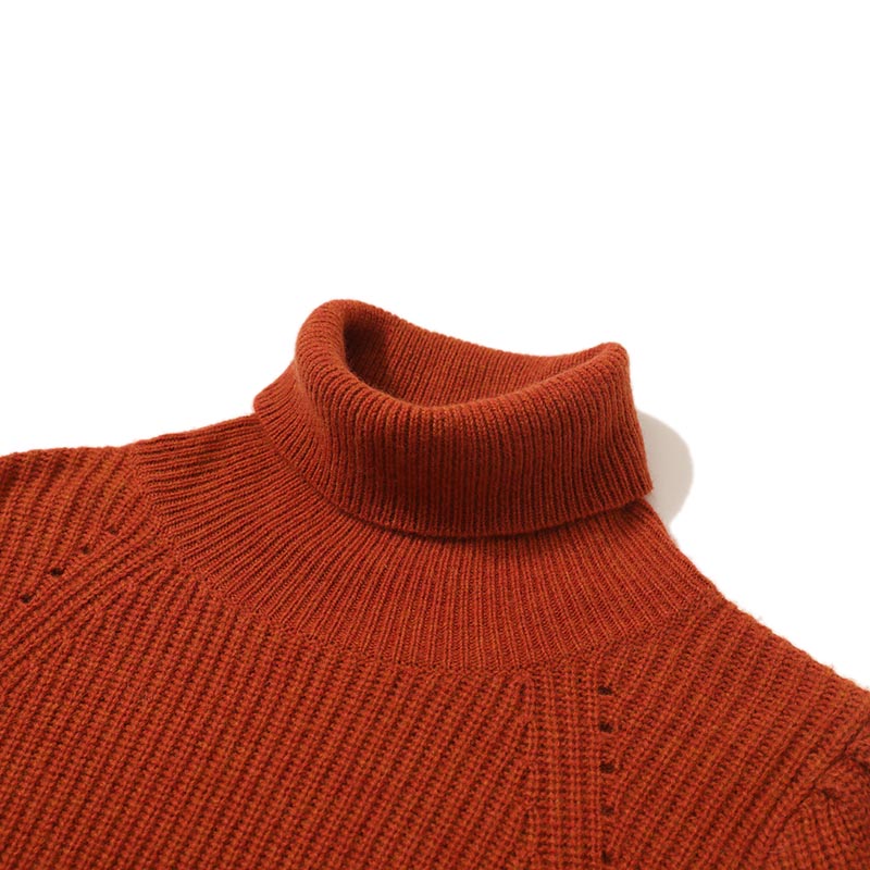 Close-up of 7GG rib knit turtleneck collar and merino wool texture on heavyweight fully fashioned sweater