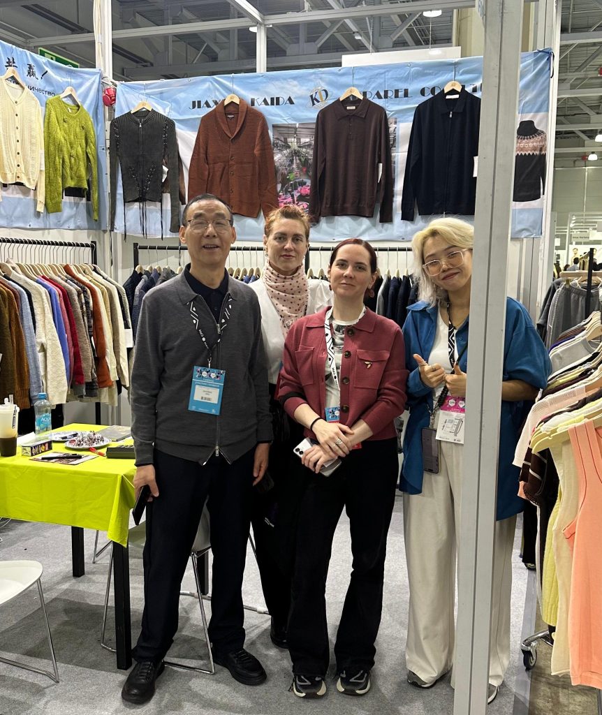 KAIDA Knitwear booth at an international fashion exhibition